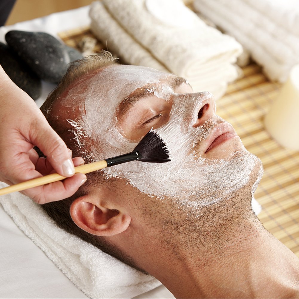 Man undergoing a facial beauty treatment