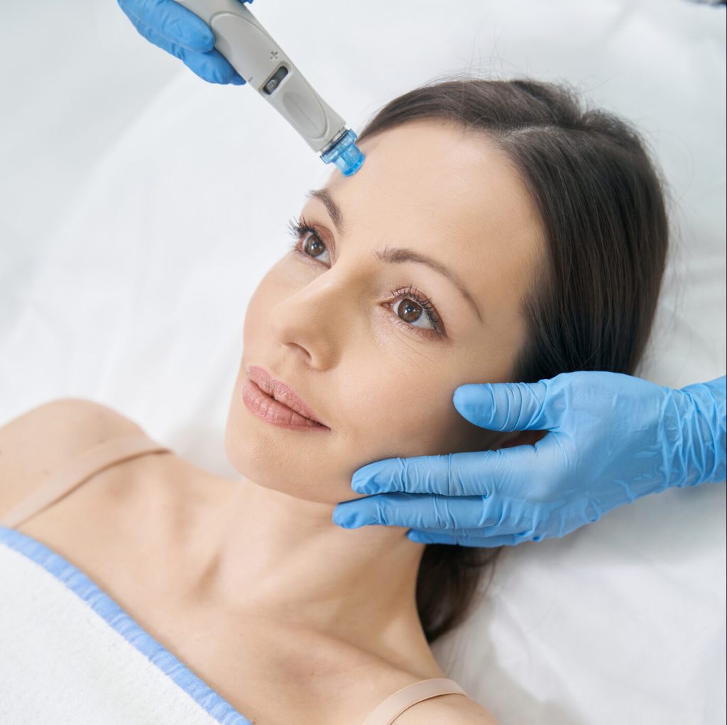 Woman having hydrafacial skincare procedure