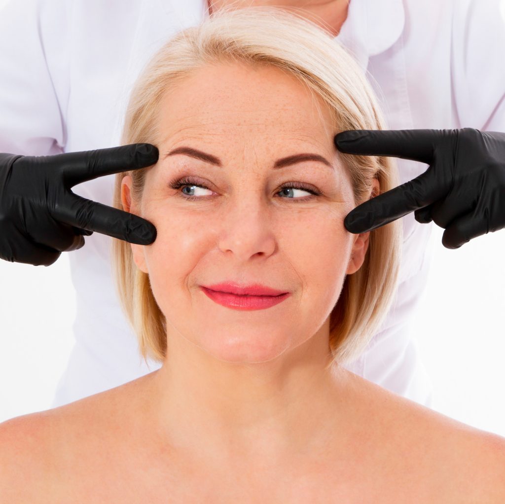 Woman getting ready for neurotoxin treatment