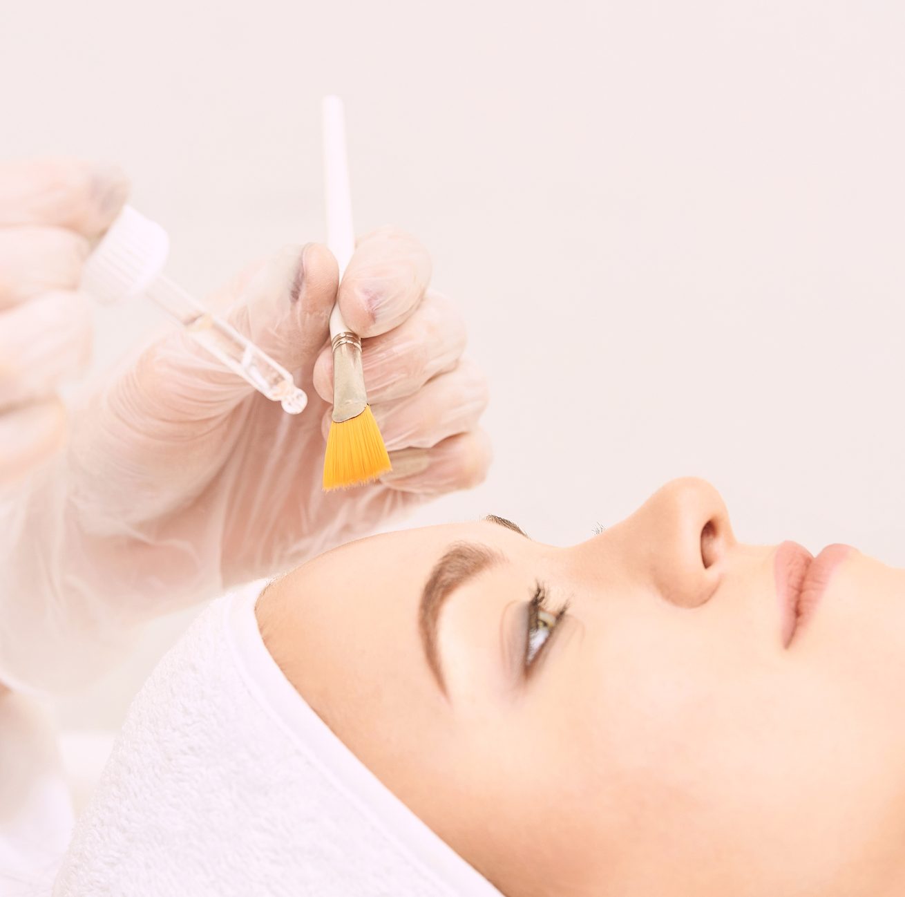 woman cleaning face skin