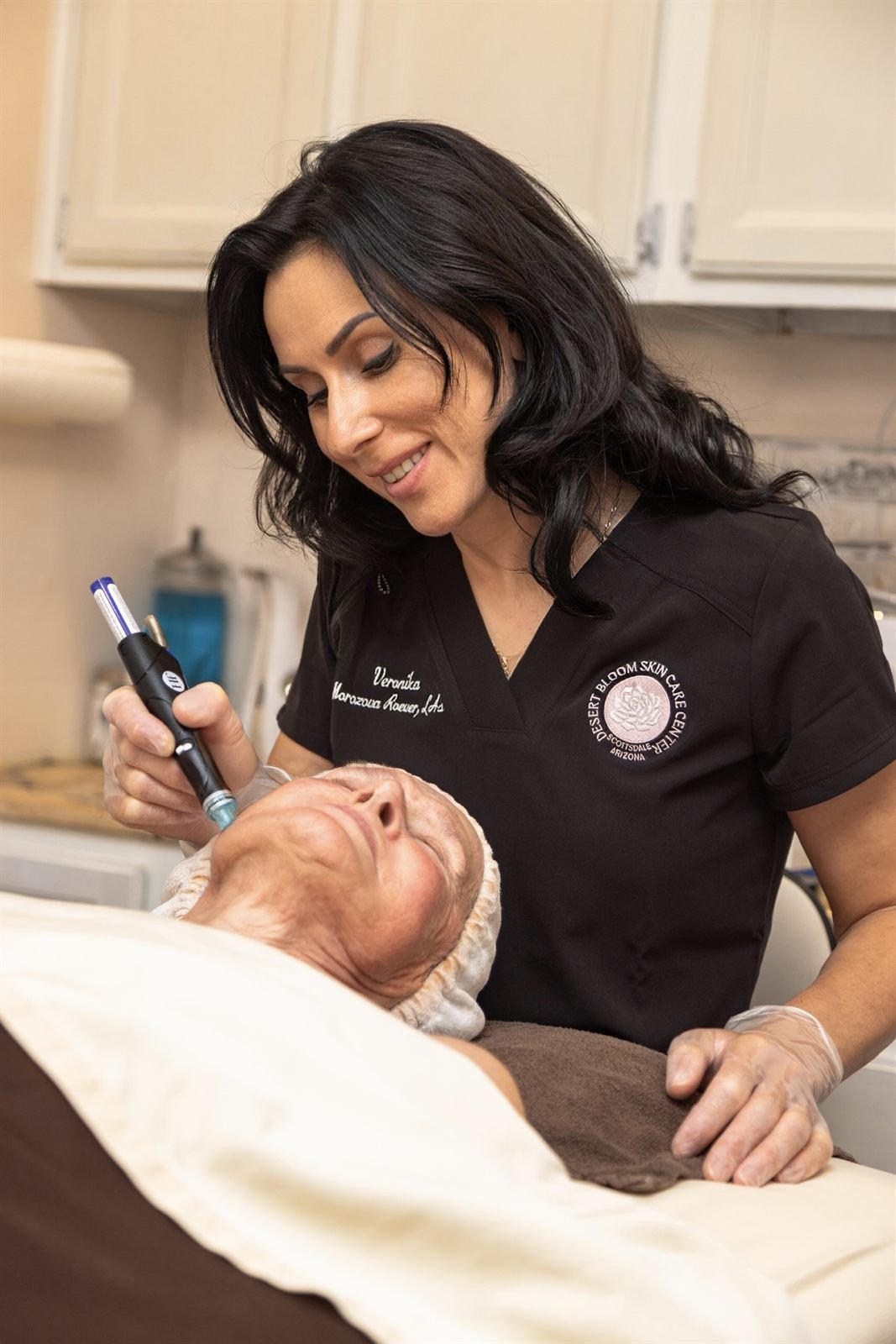 Veronika Morozova giving a facial treatment at Desert Bloom
